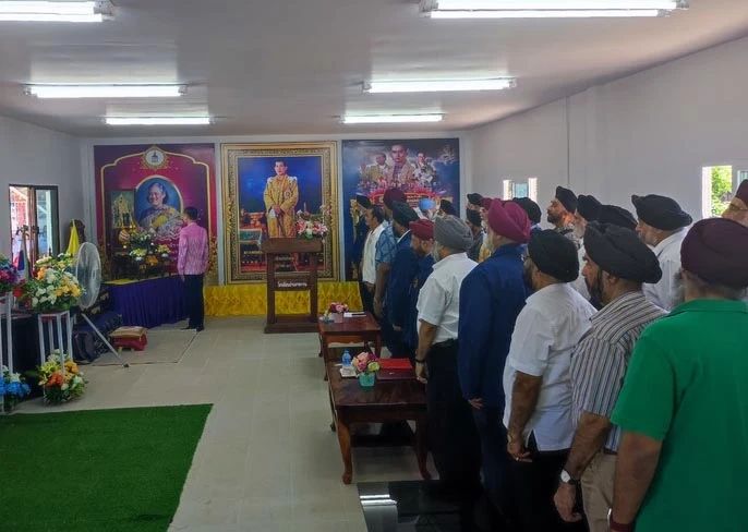 Members of the Thai Sikh community pay respects