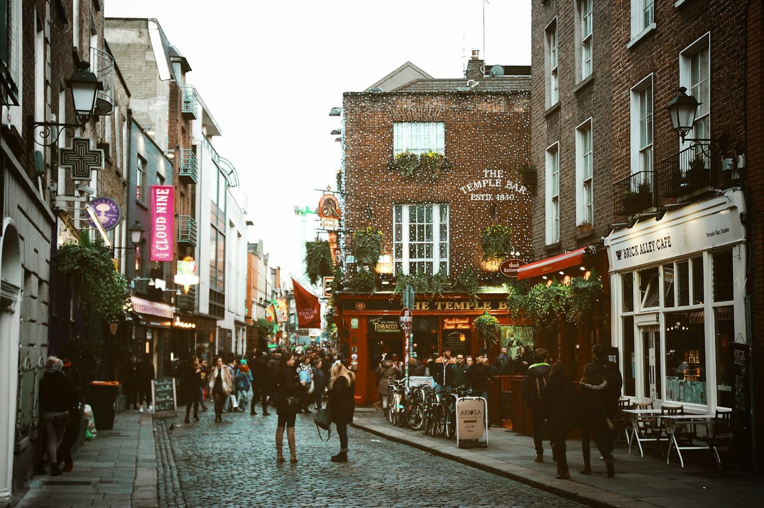 A lively pedestrian street full of people